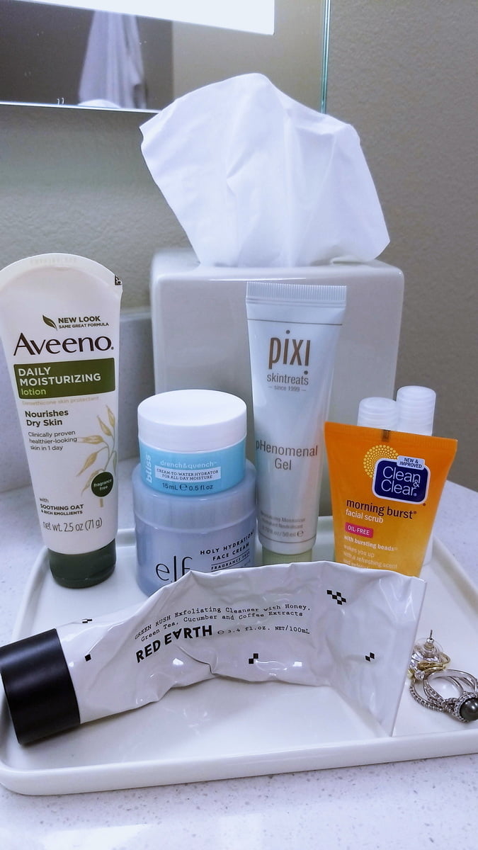 Skincare products displayed on a bathroom counter | Sincerely Yasmin
