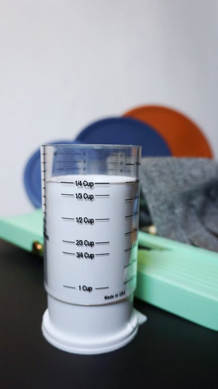Helpful Kitchen Gadgets - Adjustable Measuring Cup | Sincerely Yasmin